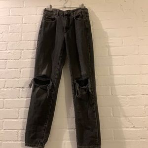 i it’s a garage denim ripped mom black jeans